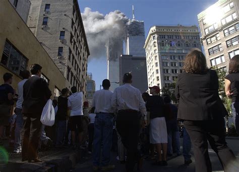 9/11 woman in red dress|9/11 photographers reveal behind.